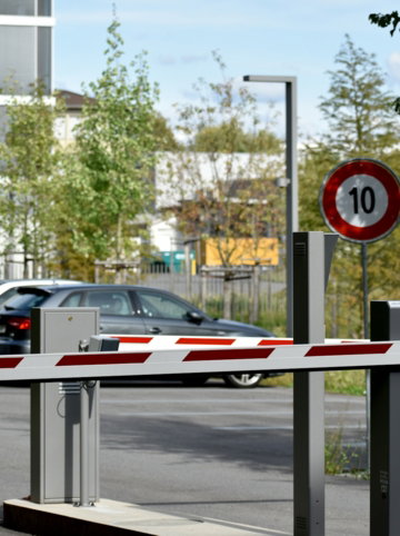 white-and-red-sedan-on-road-during-daytime.jpg white and red sedan on road during daytime
